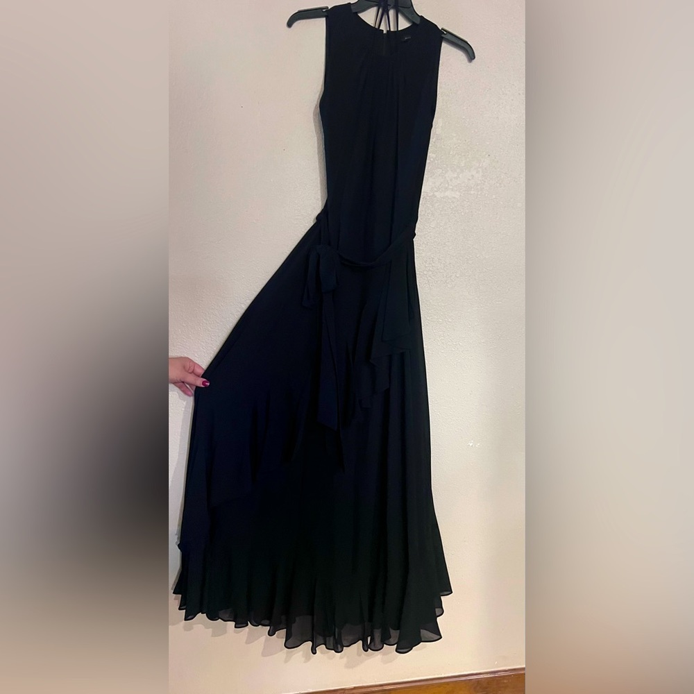 The brand is Alex Marie the color is black and the size is a 12